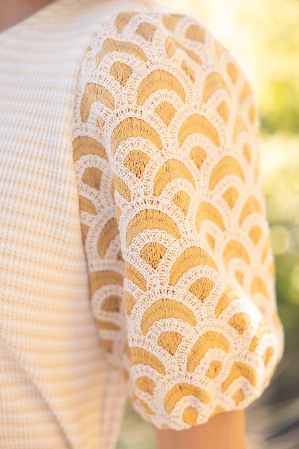 Embroidered Scallop Sleeve Striped Knit Top